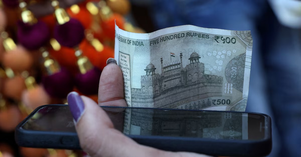 Rupee risks steeper fall past 90/Dollar without RBI help, India-US trade deal